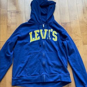 Blue and Yellow North Face zip up sweater